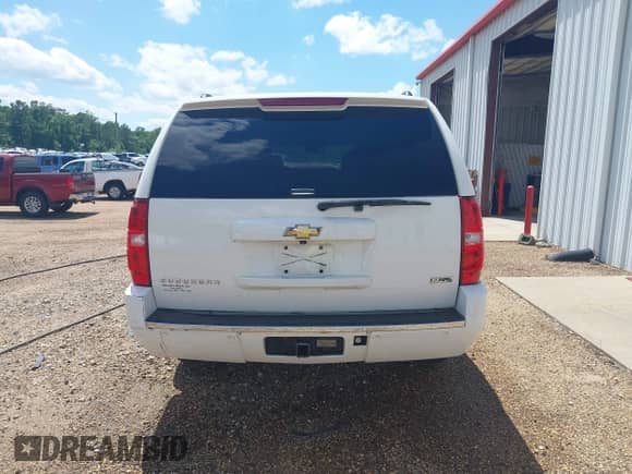 2011 Chevrolet Suburban LTZ with VIN 1GNSKKE37BR348112, listed as a IAAI auction lot 42267962 with 163,558 mi miles and . Bid and sale history available at DreamBid. Image 16.