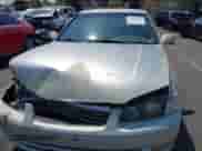 2001 Toyota Camry LE z VIN 4T1BG22K31U043493, wystawiony jako IAAI lot #42986379 z przebiegiem 213 223 mil mil oraz . Historia ofert i sprzedaży dostępna na DreamBid. Obrazek 12.