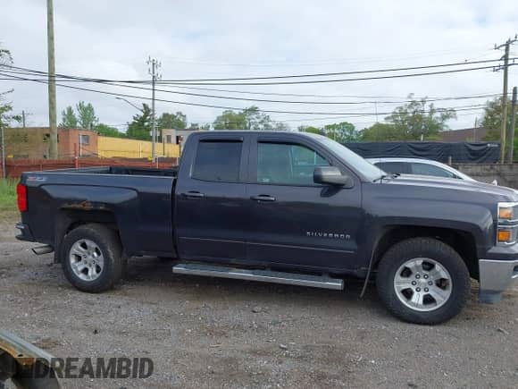 2015 Chevrolet Silverado 1500 LT with VIN 1GCVKRECXFZ204008, listed as a IAAI auction lot 42294936 with 156,321 mi miles and . Bid and sale history available at DreamBid. Image 13.