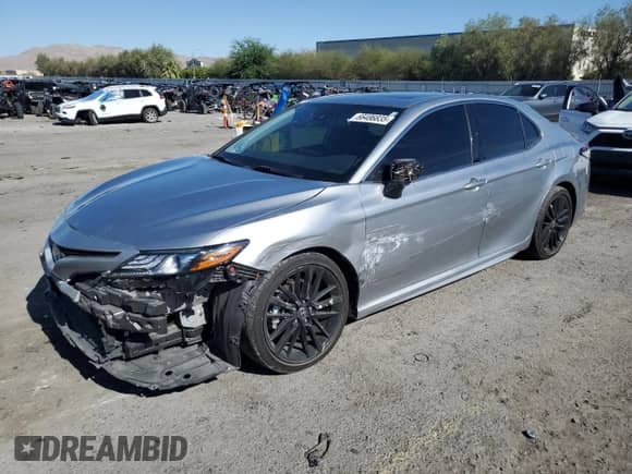 2023 Toyota Camry Hybrid XSE с VIN 4T1K31AKXPU609407, выставлен на аукционе Copart как лот 66486835 с пробегом 26 892 миль миль и Списание • Salvage title. История ставок и продаж доступна на DreamBid. Изображение 1.