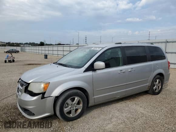 2011 Dodge Grand Caravan Crew with VIN 2D4RN5DG6BR689258, listed as a Copart auction lot 80556795 with 149,320 mi miles and Salvage title. Bid and sale history available at DreamBid. Image 1.