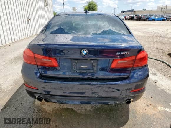 2017 BMW 5 Series 530i with VIN WBAJA5C33HG456417, listed as a Copart auction lot 68673915 with 141,058 mi miles and Clean title. Bid and sale history available at DreamBid. Image 6.