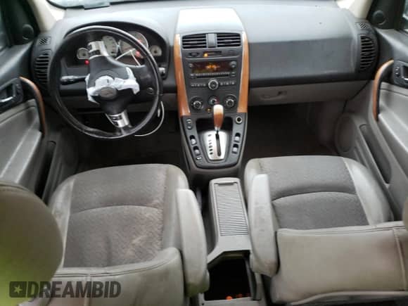 2006 Saturn VUE z VIN 5GZCZ53436S875468, wystawiony jako Copart lot #71047684 z przebiegiem 201 881 mil mil oraz Szkoda całkowita • Salvage title. Historia ofert i sprzedaży dostępna na DreamBid. Obrazek 8.