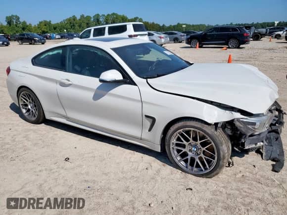 2019 BMW 4 Series 430i with VIN WBA4W3C57KAG91422, listed as a Copart auction lot 71100255 with 91,847 mi miles and Salvage title. Bid and sale history available at DreamBid. Image 4.