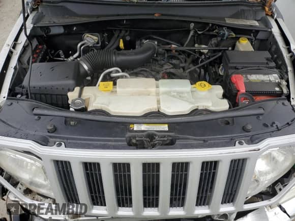 2011 Jeep Liberty Sport with VIN 1J4PN2GK6BW580142, listed as a Copart auction lot 82433075 with 119,651 mi miles and Clean title. Bid and sale history available at DreamBid. Image 12.