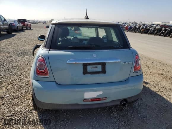 2011 MINI Hardtop with VIN WMWSU3C52BT253034, listed as a Copart auction lot 90109305 with 50,636 mi miles and Salvage title. Bid and sale history available at DreamBid. Image 6.