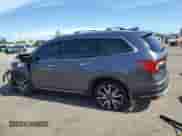 2021 Honda Pilot Touring 8-Passenger z VIN 5FNYF6H94MB034392, wystawiony jako Copart lot #68621825 z przebiegiem Nie podano mil oraz Nie do naprawy • Non repairable. Historia ofert i sprzedaży dostępna na DreamBid. Obrazek 2.