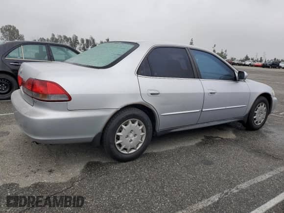 2001 Honda Accord LX z VIN 1HGCG65581A039335, wystawiony jako Copart lot #44390165 z przebiegiem 207 039 mil mil oraz Szkoda całkowita • Salvage title. Historia ofert i sprzedaży dostępna na DreamBid. Obrazek 3.
