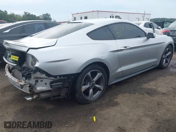 2015 Ford Mustang V6 with VIN 1FA6P8AM3F5389076, listed as a IAAI auction lot 43320824 with 125,113 mi miles and . Bid and sale history available at DreamBid. Image 4.