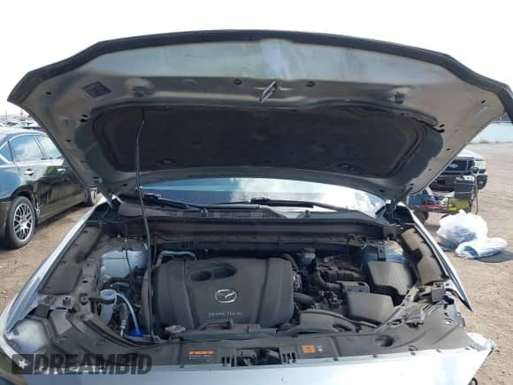 2023 Mazda CX-5 S Carbon Edition z VIN JM3KFBCM0P0137474, wystawiony jako IAAI lot #42785110 z przebiegiem 39 335 mil mil oraz . Historia ofert i sprzedaży dostępna na DreamBid. Obrazek 10.