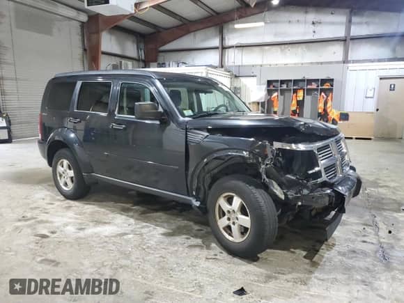 2009 Dodge Nitro SE with VIN 1D8GU28K89W531530, listed as a Copart auction lot 64177005 with 99,861 mi miles and Clean title. Bid and sale history available at DreamBid. Image 4.