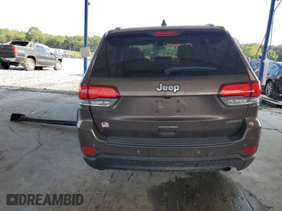 2021 Jeep Grand Cherokee Laredo X с VIN 1C4RJEAG9MC798015, выставлен на аукционе Copart как лот 69563455 с пробегом 66 473 миль миль и Списание • Salvage title. История ставок и продаж доступна на DreamBid. Изображение 6.