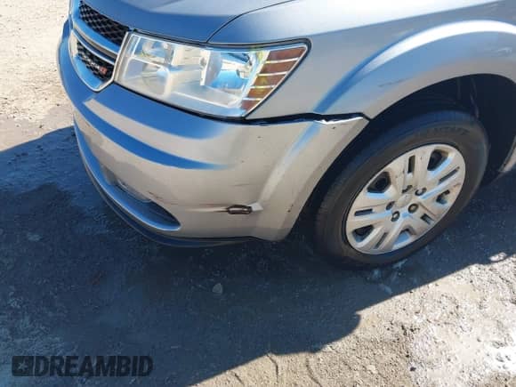 2016 Dodge Journey SE with VIN 3C4PDCAB0GT186088, listed as a IAAI auction lot 43329473 with 169,972 mi miles and . Bid and sale history available at DreamBid. Image 6.