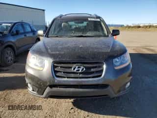 2011 Hyundai Santa Fe SE z VIN 5XYZHDAG2BG015003, wystawiony jako Copart lot #86767085 z przebiegiem 268 192 mil mil oraz Szkoda całkowita • Salvage title. Historia ofert i sprzedaży dostępna na DreamBid. Obrazek 5.