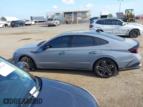 2025 Hyundai Sonata N Line с VIN KMHL54JC7SA455080, выставлен на аукционе IAAI как лот 42791655 с пробегом 8 332 миль миль и . История ставок и продаж доступна на DreamBid. Изображение 14.