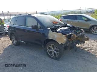 2016 Subaru Forester Touring with VIN JF2SJAVC2GH541823, listed as a IAAI auction lot 42860303 with 42,475 mi miles and . Bid and sale history available at DreamBid. Image 1.