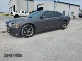 2014 Dodge Charger SXT with VIN 2C3CDXHG6EH258512, listed as a Copart auction lot 71846065 with 186,559 mi miles and Salvage title. Bid and sale history available at DreamBid. Image 1.