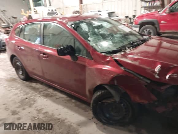 2017 Subaru Impreza with VIN 4S3GTAA64H3754981, listed as a IAAI auction lot 41087979 with 70,205 mi miles and . Bid and sale history available at DreamBid. Image 14.