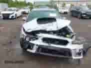 2019 Subaru WRX STI Limited z VIN JF1VA2V63K9807256, wystawiony jako IAAI lot #42390008 z przebiegiem 74 821 mil mil oraz . Historia ofert i sprzedaży dostępna na DreamBid. Obrazek 6.