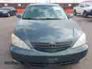 2004 Toyota Camry LE with VIN 4T1BE32K94U339635, listed as a IAAI auction lot 43041101 with 153,448 mi miles and . Bid and sale history available at DreamBid. Image 6.