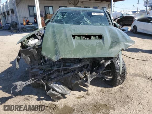 2022 Toyota Tacoma SR5 z VIN 3TMDZ5BN9NM133972, wystawiony jako Copart lot #50102025 z przebiegiem 12 598 mil mil oraz Szkoda całkowita • Salvage title. Historia ofert i sprzedaży dostępna na DreamBid. Obrazek 5.