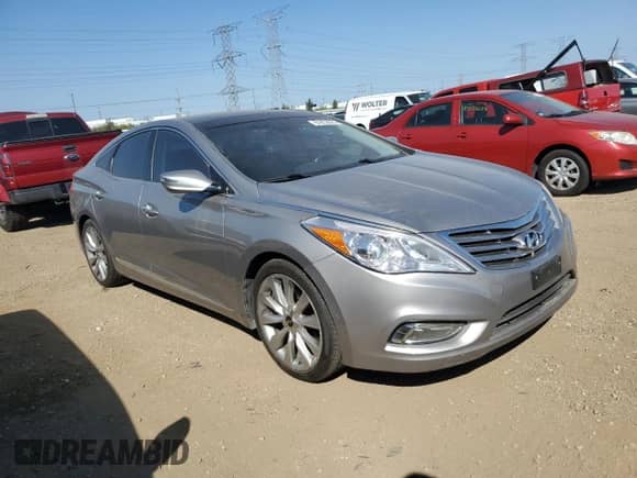 2014 Hyundai Azera Limited с VIN KMHFH4JG9EA342839, выставлен на аукционе Copart как лот 81852625 с пробегом 130 561 миль миль и Чистый • Clean title. История ставок и продаж доступна на DreamBid. Изображение 4.