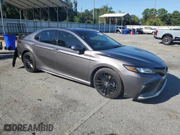 2023 Toyota Camry TRD with VIN 4T1KZ1AK9PU086122, listed as a Copart auction lot 70961135 with 36,193 mi miles and Salvage title. Bid and sale history available at DreamBid. Image 4.