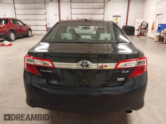 2013 Toyota Camry XLE with VIN 4T1BD1FK5DU097069, listed as a IAAI auction lot 43052279 with 90,257 mi miles and . Bid and sale history available at DreamBid. Image 16.