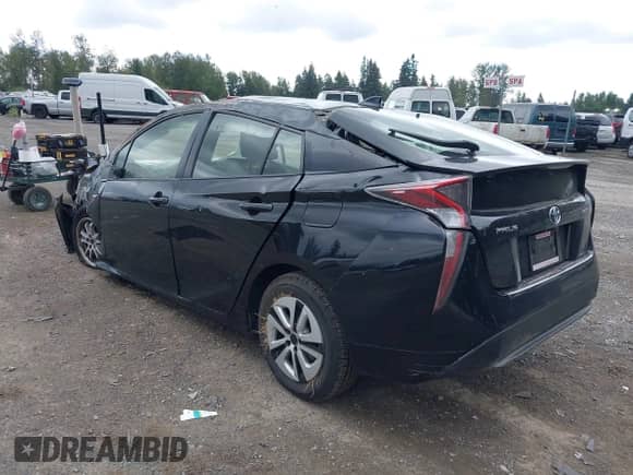 2016 Toyota Prius Two with VIN JTDKBRFU8G3011001, listed as a IAAI auction lot 42910688 with 129,322 mi miles and . Bid and sale history available at DreamBid. Image 3.