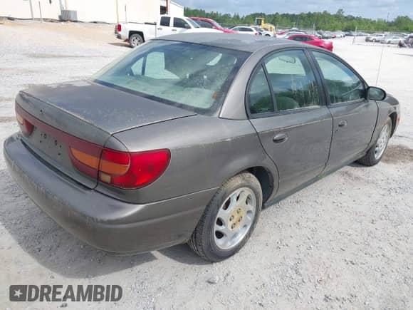 2000 Saturn SL с VIN 1G8ZK527XYZ121984, выставлен на аукционе IAAI как лот 42099839 с пробегом 174 210 миль миль и . История ставок и продаж доступна на DreamBid. Изображение 4.