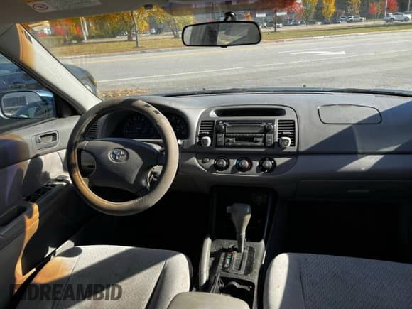 2003 Toyota Camry XLE с VIN 4T1BE32KX3U652157, выставлен на аукционе Copart как лот 89928385 с пробегом 259 300 миль миль и Чистый • Clean title. История ставок и продаж доступна на DreamBid. Изображение 9.