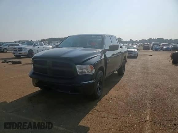 2018 Ram 1500 Tradesman z VIN 1C6RR6KG3JS313583, wystawiony jako Copart lot #67726765 z przebiegiem 93 998 mil mil oraz Szkoda całkowita • Salvage title. Historia ofert i sprzedaży dostępna na DreamBid. Obrazek 13.