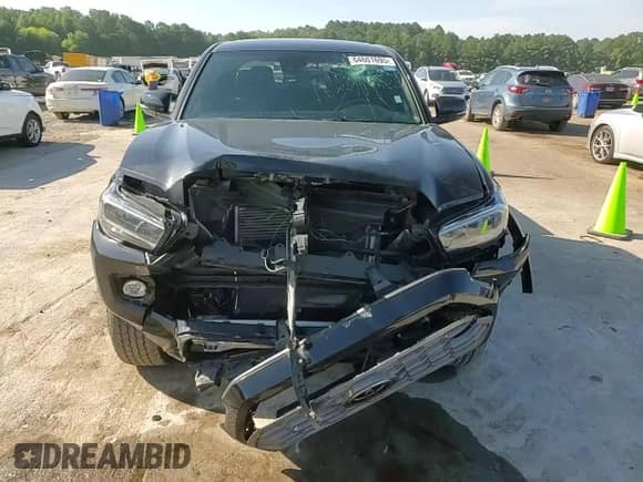 2023 Toyota Tacoma SR with VIN 3TYCZ5AN8PT160505, listed as a Copart auction lot 64601695 with 35,234 mi miles and Salvage title. Bid and sale history available at DreamBid. Image 13.