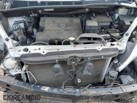 2015 Toyota Sienna LE z VIN 5TDJK3DC5FS125313, wystawiony jako Copart lot #68754505 z przebiegiem 121 490 mil mil oraz Szkoda całkowita • Salvage title. Historia ofert i sprzedaży dostępna na DreamBid. Obrazek 12.