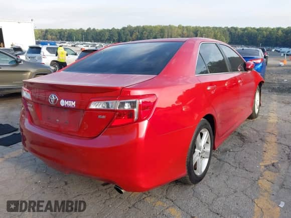 2014 Toyota Camry LE with VIN 4T1BF1FK6EU871972, listed as a IAAI auction lot 43285820 with 196,225 mi miles and . Bid and sale history available at DreamBid. Image 4.