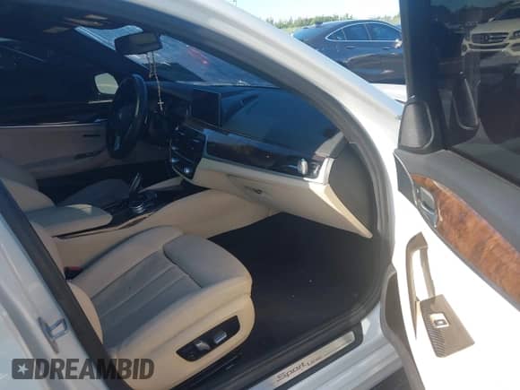 2017 BMW 5 Series 530i с VIN WBAJA5C3XHG897896, выставлен на аукционе IAAI как лот 42995897 с пробегом 97 338 миль миль и . История ставок и продаж доступна на DreamBid. Изображение 5.