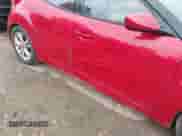 2012 Hyundai Veloster w/Gray Int z VIN KMHTC6AD1CU054540, wystawiony jako IAAI lot #43437087 z przebiegiem 173 534 mil mil oraz . Historia ofert i sprzedaży dostępna na DreamBid. Obrazek 6.