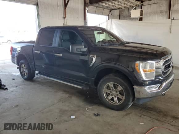 2022 Ford F-150 XLT с VIN 1FTEW1EPXNFC21125, выставлен на аукционе Copart как лот 68493115 с пробегом Не указан миль и Списание • Salvage title. История ставок и продаж доступна на DreamBid. Изображение 4.