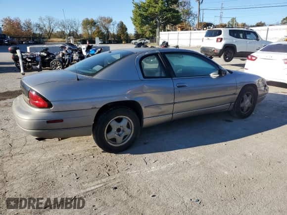 1997 Chevrolet Monte Carlo LS with VIN 2G1WW12M7V9159702, listed as a Copart auction lot 77088944 with 126,447 mi miles and Salvage title. Bid and sale history available at DreamBid. Image 3.