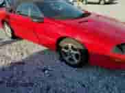 1994 Chevrolet Camaro z VIN 2G1FP32S4R2190234, wystawiony jako Copart lot #71069555 z przebiegiem 109 411 mil mil oraz Szkoda całkowita • Salvage title. Historia ofert i sprzedaży dostępna na DreamBid. Obrazek 13.