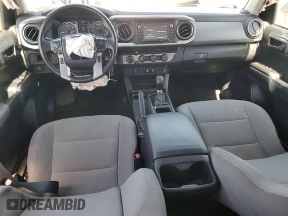 2019 Toyota Tacoma SR with VIN 3TMCZ5AN3KM244008, listed as a Copart auction lot 68974465 with 123,236 mi miles and Salvage title. Bid and sale history available at DreamBid. Image 8.