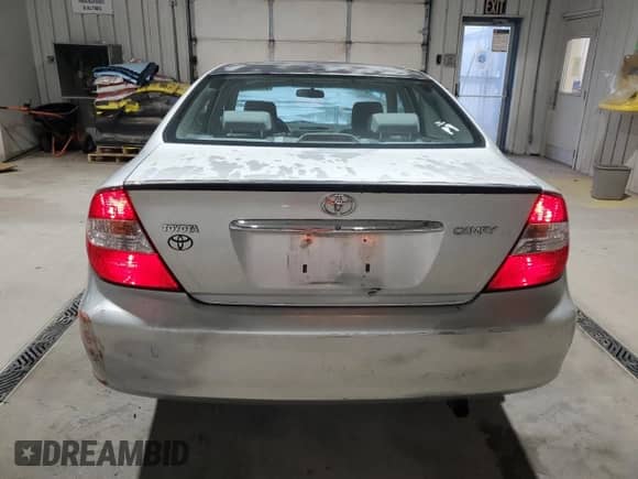 2003 Toyota Camry XLE с VIN 4T1BE32KX3U729691, выставлен на аукционе Copart как лот 84183735 с пробегом 263 739 миль миль и Списание • Salvage title. История ставок и продаж доступна на DreamBid. Изображение 6.