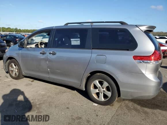 2012 Toyota Sienna with VIN 5TDZK3DC3CS210035, listed as a Copart auction lot 83798255 with 319,065 mi miles and Salvage title. Bid and sale history available at DreamBid. Image 2.