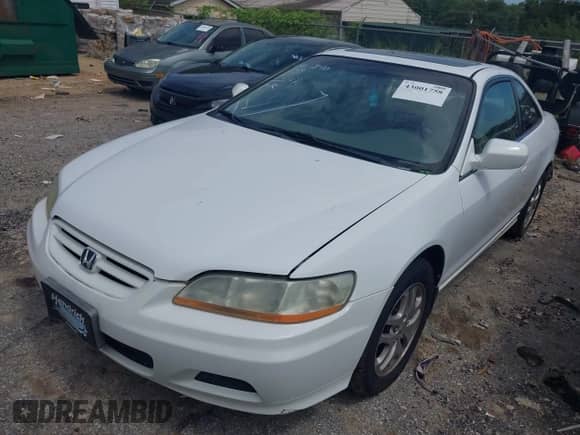 2002 Honda Accord EX with VIN 1HGCG22552A034799, listed as a IAAI auction lot 43001758 with 192,922 mi miles and . Bid and sale history available at DreamBid. Image 2.