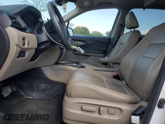 2021 Honda Pilot Touring 8-Passenger z VIN 5FNYF5H96MB011738, wystawiony jako Copart lot #68089255 z przebiegiem 126 655 mil mil oraz Szkoda całkowita • Salvage title. Historia ofert i sprzedaży dostępna na DreamBid. Obrazek 7.