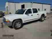 2001 Dodge Dakota Sport с VIN 1B7HL2AX81S343985, выставлен на аукционе Copart как лот 82498565 с пробегом 247 286 миль миль и Списание • Salvage title. История ставок и продаж доступна на DreamBid. Изображение 1.