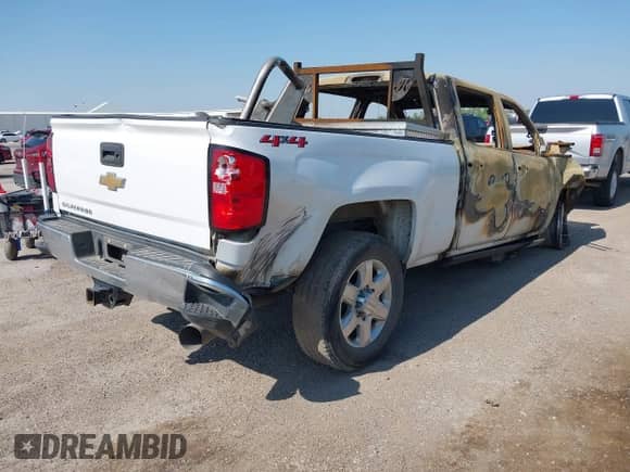 2019 Chevrolet Silverado 2500HD Work Truck z VIN 1GC1KREY8KF191474, wystawiony jako IAAI lot #41939424 z przebiegiem Nie podano mil oraz . Historia ofert i sprzedaży dostępna na DreamBid. Obrazek 4.