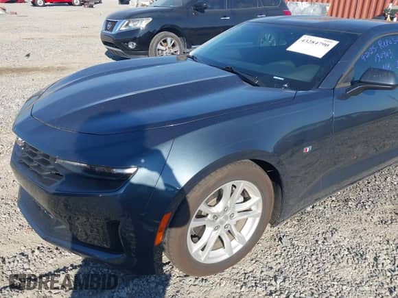 2021 Chevrolet Camaro 1LS with VIN 1G1FB1RX5M0130963, listed as a IAAI auction lot 43284790 with 57,472 mi miles and . Bid and sale history available at DreamBid. Image 6.