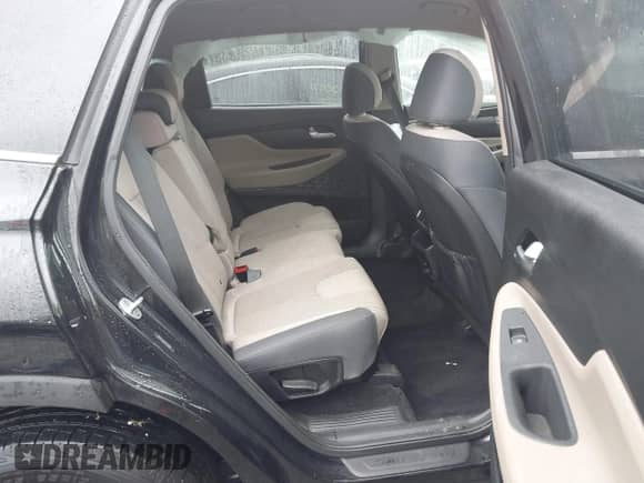 2019 Hyundai Santa Fe SEL with VIN 5NMS3CAD7KH131884, listed as a IAAI auction lot 43025635 with 70,150 mi miles and . Bid and sale history available at DreamBid. Image 8.