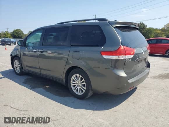 2012 Toyota Sienna XLE with VIN 5TDYK3DC8CS176623, listed as a Copart auction lot 80257225 with 262,472 mi miles and Salvage title. Bid and sale history available at DreamBid. Image 2.